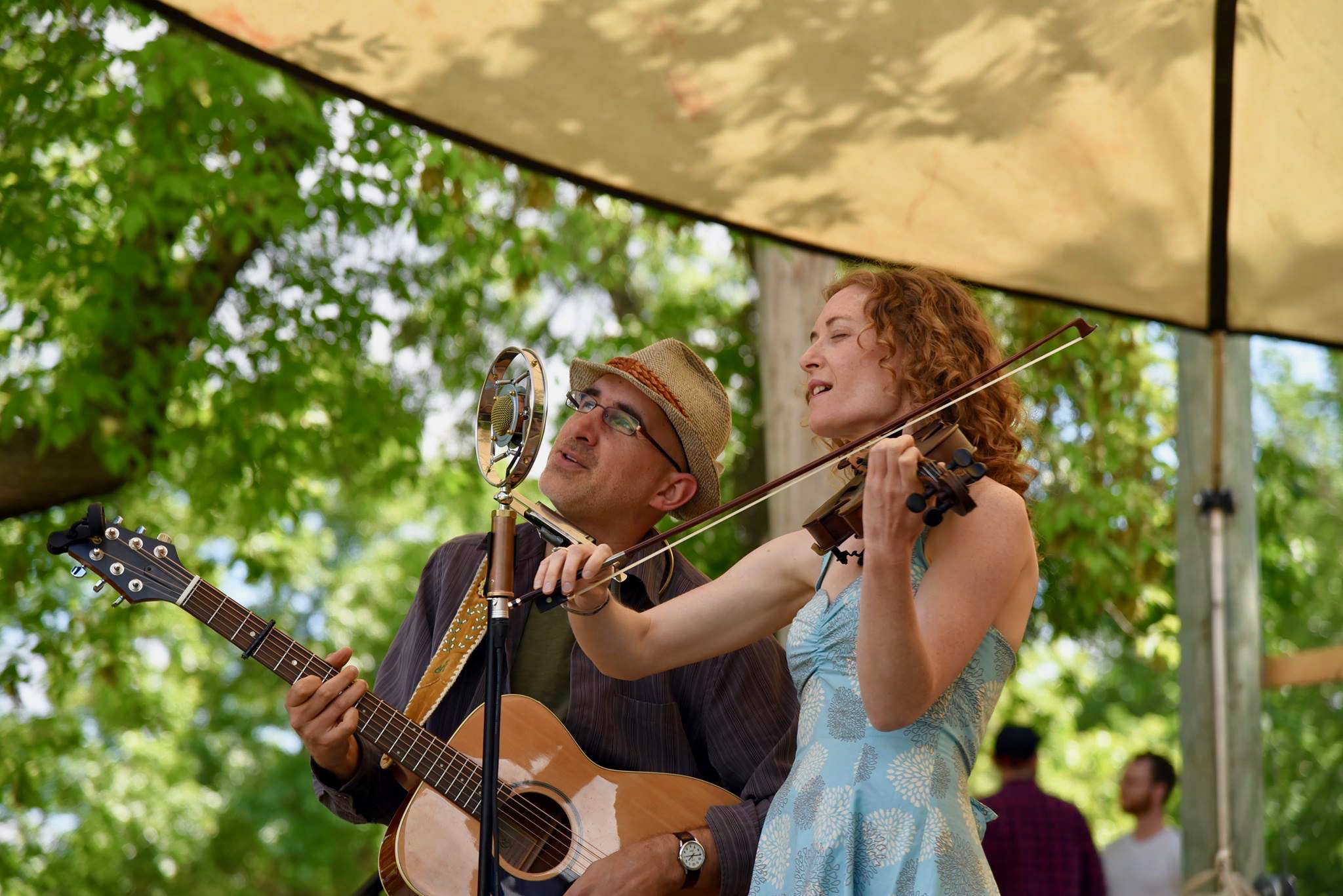 Dan Frechette & Laurel Thomsen performing at a festival