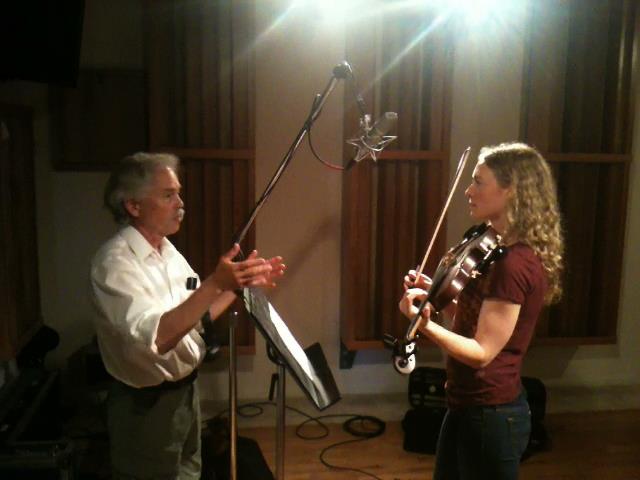 Violinist Laurel Thomsen consulting with recording engineer Joe Weed in his Los Gatos recording studio